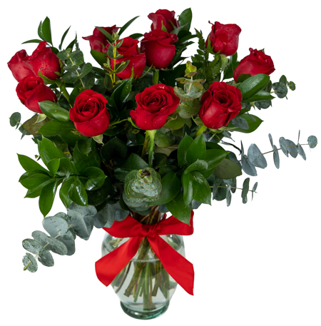 docena de rosas rojas en florero de vidrio con moño